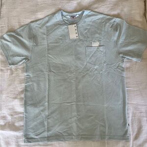 Men’s baby blue undefeated pocket t-shirt NWT